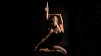 A ballet dancer holiding a pose