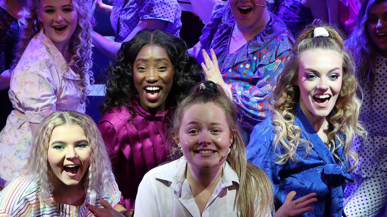 Close-up of performers on stage